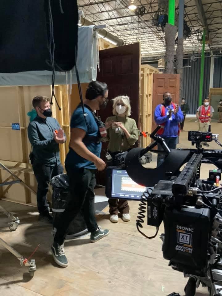A working Atlanta film set — crew, monitors, and a camera rig between takes